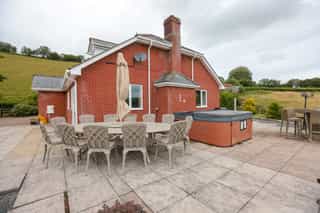 The patio, terrace and hot tub at Castle View Lodge